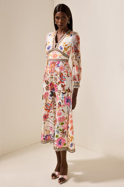 Vestido midi con cuello en V y mangas farol con estampado floral 