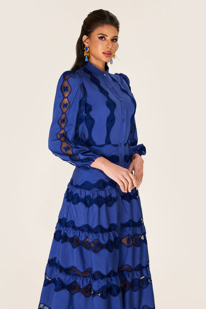 Vestido midi con bajo liso bordado 