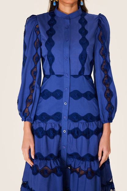 Vestido midi con bajo liso bordado 