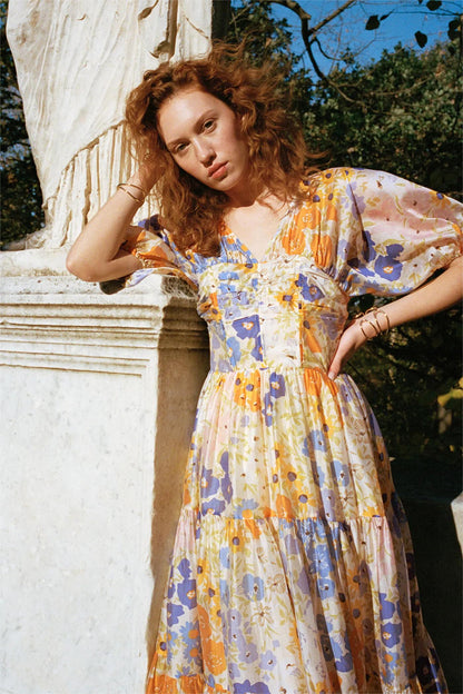 Vestido largo con cuello en V y mangas abullonadas con estampado floral 