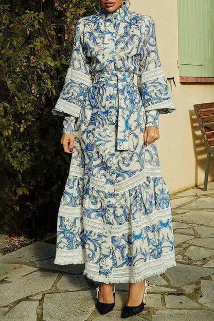 Vestido largo con cuello alto, mangas farol y patchwork estampado 