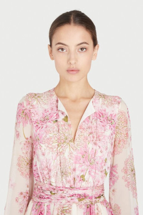 Vestido largo con cuello redondo y mangas abullonadas y estampado floral 