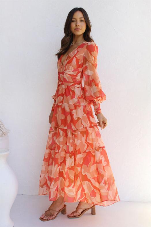 Vestido midi floral con cuello en V y mangas farol 