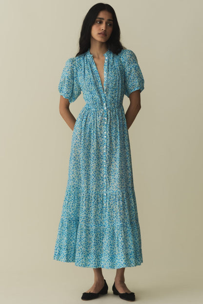 Vestido midi de una sola botonadura con mangas abullonadas y estampado floral 