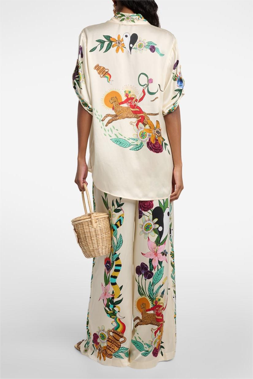 Conjunto de blusa con estampado animal y pantalones anchos de cintura media 