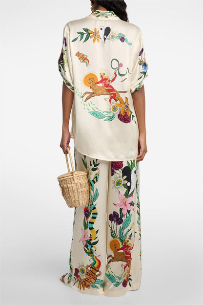 Conjunto de blusa con estampado animal y pantalones anchos de cintura media 