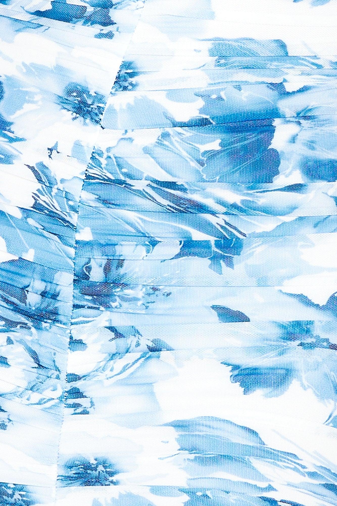 Vestido midi sin espalda con aberturas y malla floral 