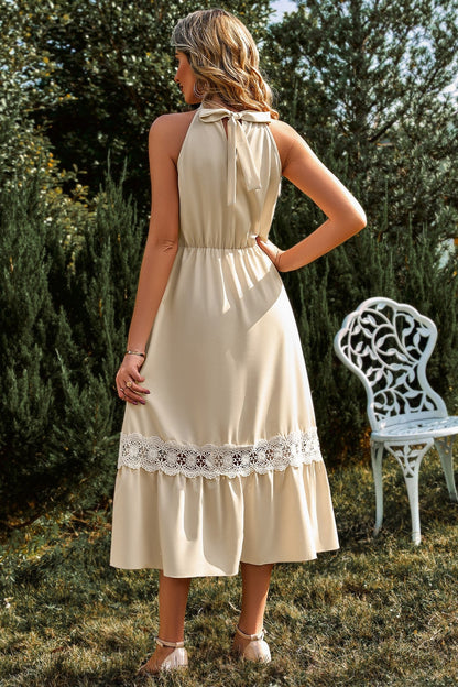 Vestido midi sin mangas con cuello alto y dobladillo de encaje 