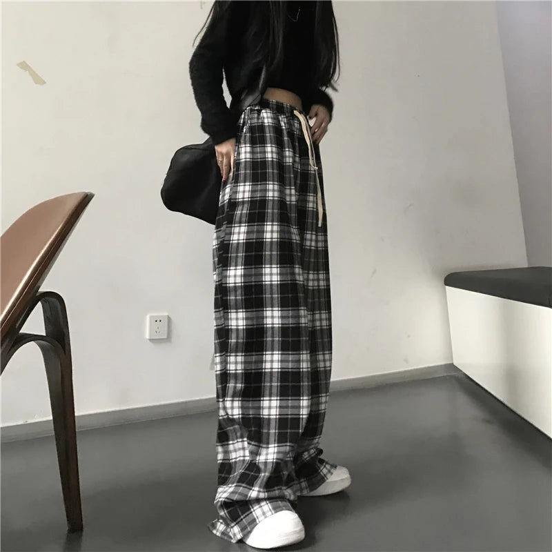 Pantalones deportivos de gran tamaño para mujer, a la moda, negros, a cuadros, informales, holgados, con cintura elástica y bolsillos, unisex, estilo hip hop para estudiantes.