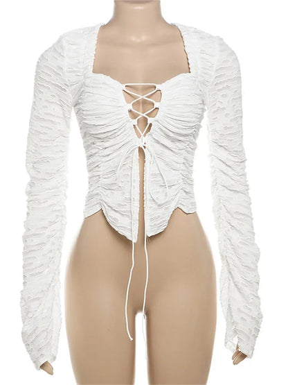 Camiseta con volantes de moda de otoño, top corto para mujer, con agujeros, cordones, patchwork, ropa de abrigo holgada, camiseta blanca de vendaje para mujer