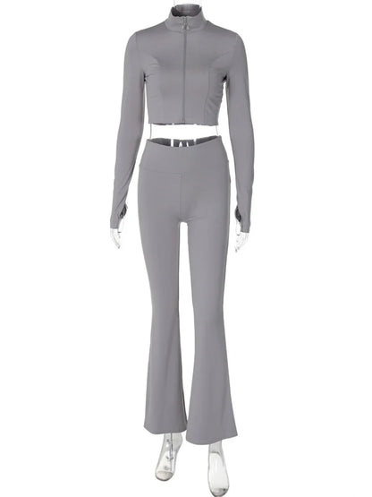 Conjunto informal de invierno de dos piezas con cárdigan de pierna recta y cremallera para mujer, y chándal ajustado de cintura alta con pantalones para mujer.