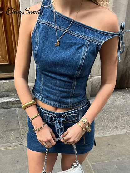 Conjuntos de falda y top de mezclilla con hombros descubiertos Y2K para mujer, chaleco corto sin mangas con cuello oblicuo ajustado, faldas ajustadas 2025, traje de calle de 2 piezas para mujer
