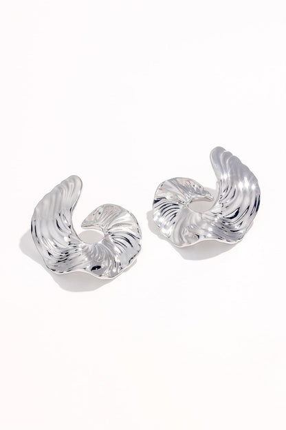 Pendientes de metal con textura irregular 