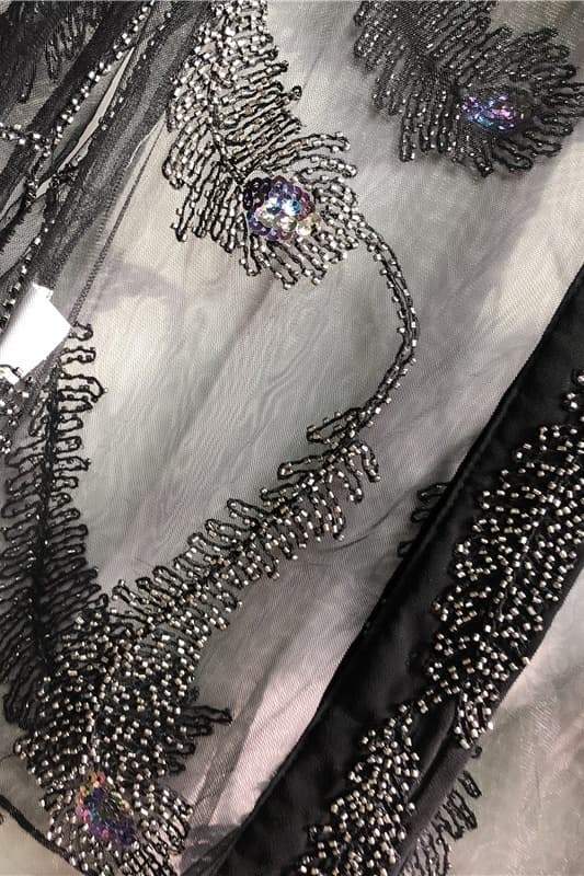 Blusa de malla con cuentas y plumas Denise 