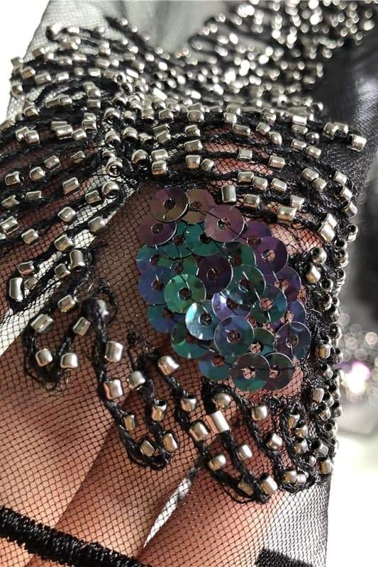 Blusa de malla con cuentas y plumas Denise 