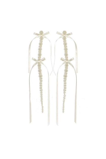 Pendientes de lazo con perlas de imitación 