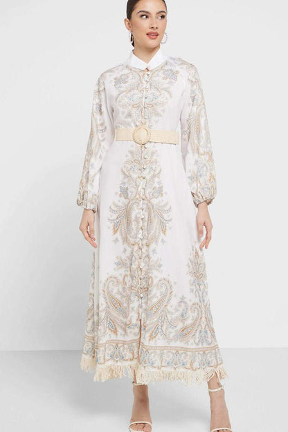 Vestido largo estampado de manga larga con borlas, botones y cinturón 