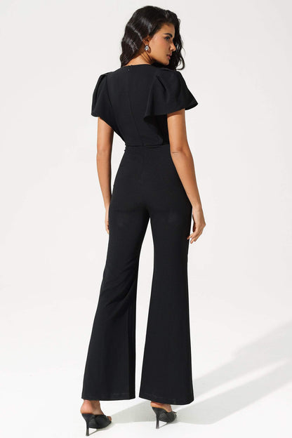 Mono con escote en V, mangas abullonadas y cintura cónica con dobladillo con volantes 