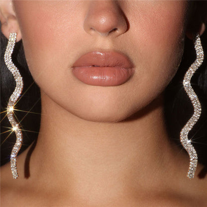 Silver Long Drop Earrings with Sparkly Wavy Rhinestone Embellishments